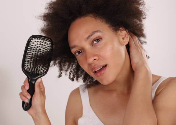 Por que eu parei de usar permanente afro no meu cabelo