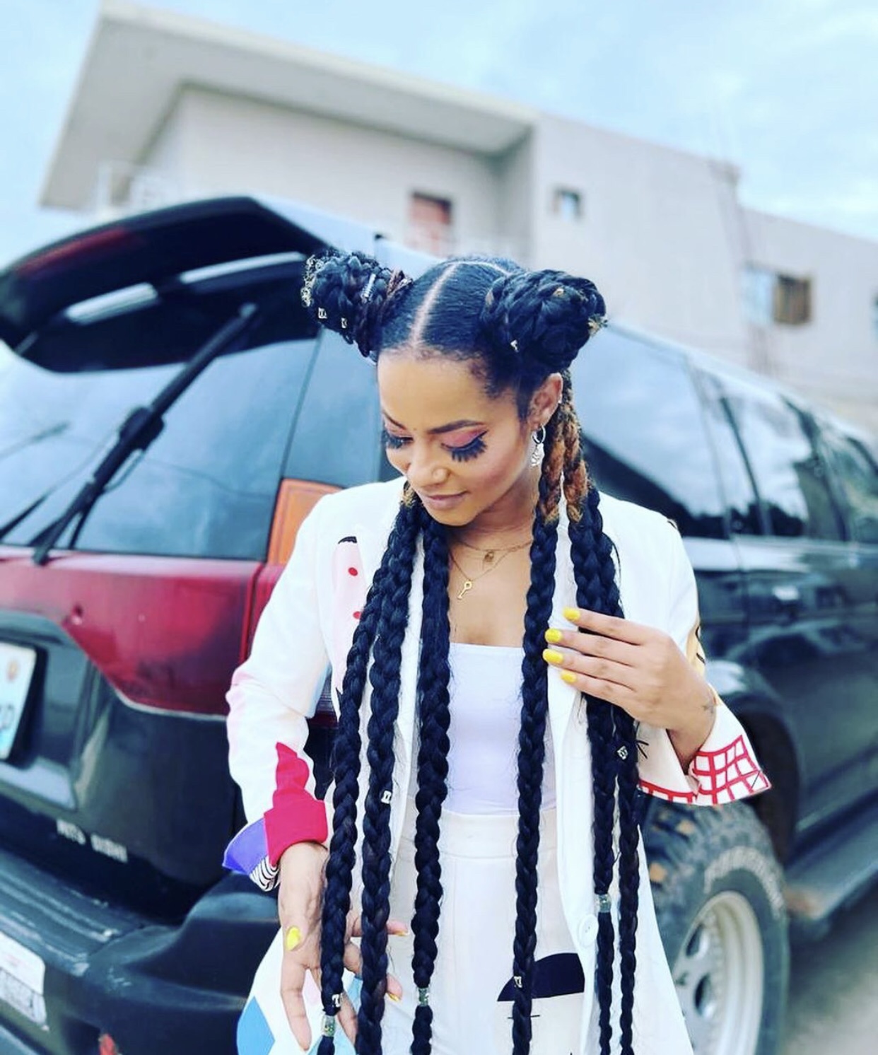 Tranças compridas e grossas com missangas